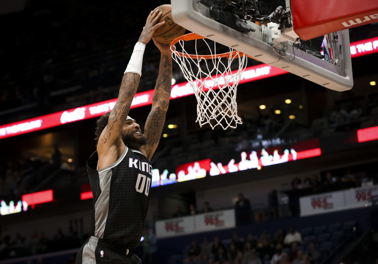 Mar 28, 2019; New Orleans, LA, USA; Sacramento Kings center Willie Cauley-Stein (00) dunks against the New Orleans Pelicans during the first quarter at the Smoothie King Center. Mandatory Credit: Derick E. Hingle-USA TODAY Sports