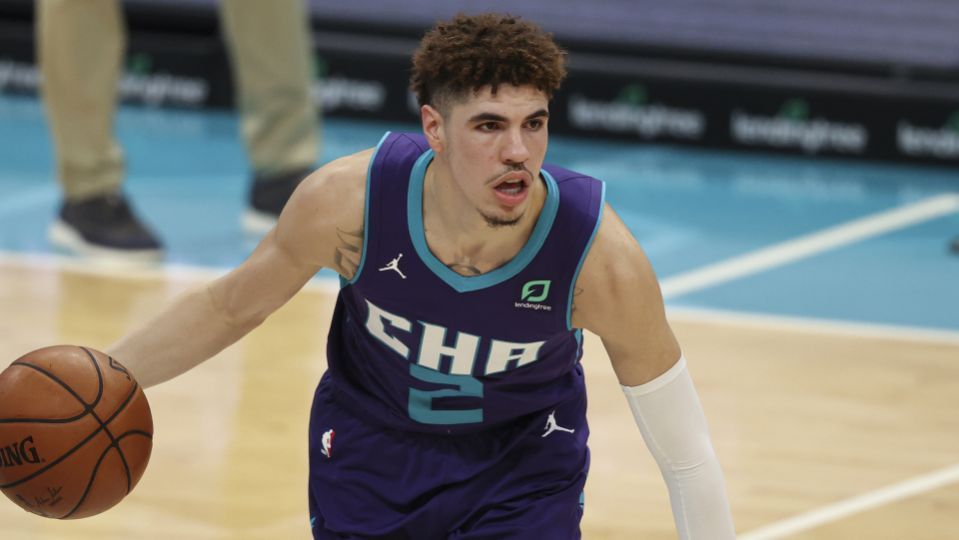 Charlotte Hornets guard LaMelo Ball brings the ball up court against the Indiana Pacers in the second half of an NBA basketball game in Charlotte, N.C., Wednesday, Jan. 27, 2021. Indiana won 116-106. (AP Photo/Nell Redmond)