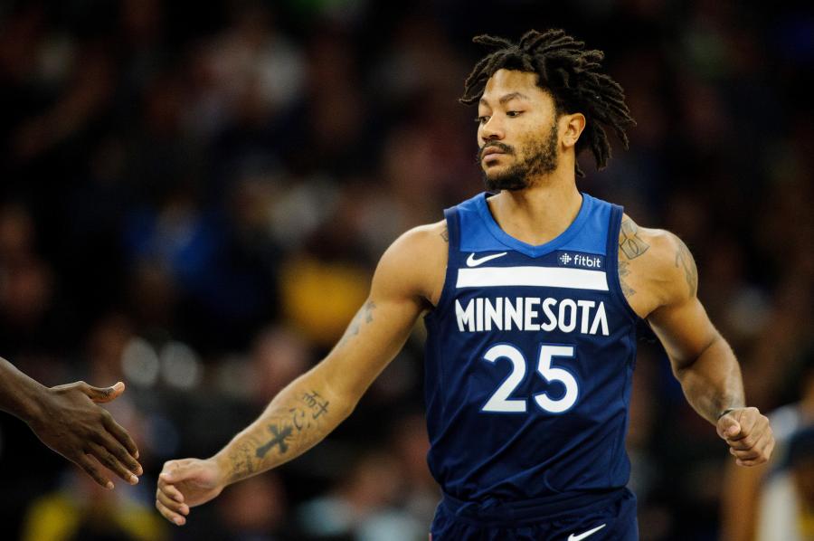 MINNEAPOLIS, MN - MARCH 11: Derrick Rose #25 of the Minnesota Timberwolves celebrates a basket with a teammate during the game against the Golden State Warriors on March 11, 2018 at the Target Center in Minneapolis, Minnesota. NOTE TO USER: User expressly acknowledges and agrees that, by downloading and or using this Photograph, user is consenting to the terms and conditions of the Getty Images License Agreement. (Photo by Hannah Foslien/Getty Images)