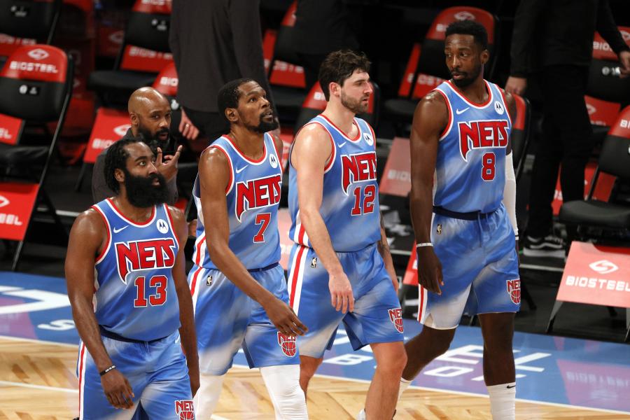 NEW YORK, NEW YORK - JANUARY 16: James Harden #13, Kevin Durant #7, Joe Harris #12, and Jeff Green #8 of the Brooklyn Nets walk onto the court during the second half against the Orlando Magic at Barclays Center on January 16, 2021 in the Brooklyn borough of New York City. The Nets won 122-115. NOTE TO USER: User expressly acknowledges and agrees that, by downloading and or using this Photograph, user is consenting to the terms and conditions of the Getty Images License Agreement. (Photo by Sarah Stier/Getty Images)