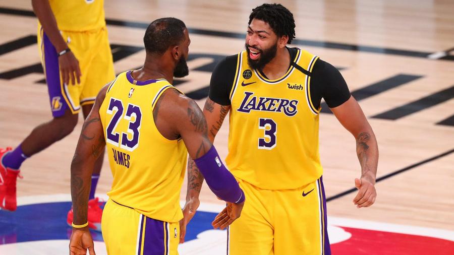 https _www.si.com_.image_MTc1NjI3NzQxNjIwNjEwNTQy_anthony-davis-lebron-james-lakers-gold