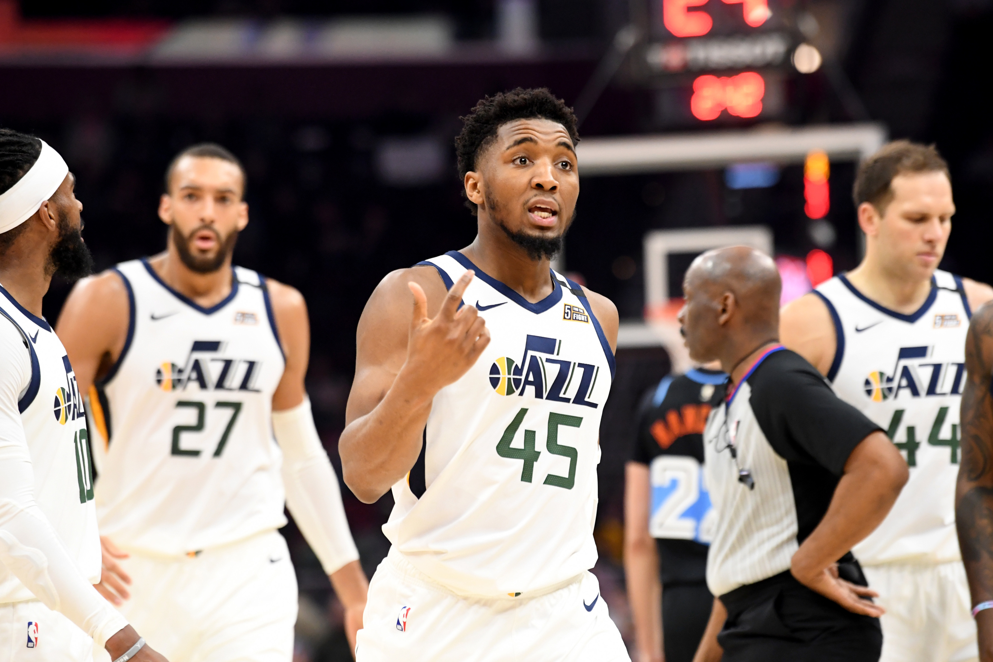 CLEVELAND, OHIO - MARCH 02: Donovan Mitchell #45 of the Utah Jazz talks to a teammate while going into a time out during the second half against the Cleveland Cavaliers at Rocket Mortgage Fieldhouse on March 02, 2020 in Cleveland, Ohio. The Jazz defeated the Cavaliers 126-113. NOTE TO USER: User expressly acknowledges and agrees that, by downloading and/or using this photograph, user is consenting to the terms and conditions of the Getty Images License Agreement. (Photo by Jason Miller/Getty Images)