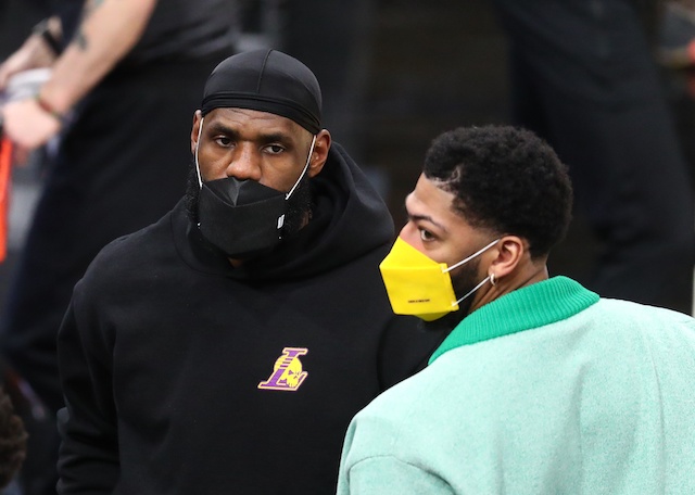 Mar 21, 2021; Phoenix, Arizona, USA; Los Angeles Lakers injured forward LeBron James (left) and Anthony Davis against the Phoenix Suns during the first half at Phoenix Suns Arena. Mandatory Credit: Mark J. Rebilas-USA TODAY Sports