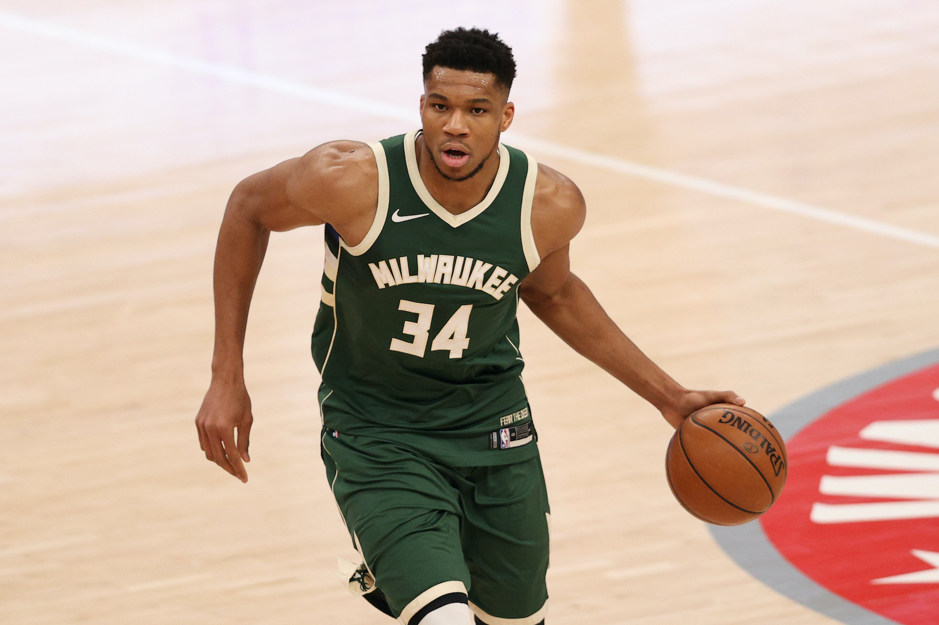 WASHINGTON, DC - MARCH 15: Giannis Antetokounmpo #34 of the Milwaukee Bucks in action against the Washington Wizards at Capital One Arena on March 15, 2021 in Washington, DC. NOTE TO USER: User expressly acknowledges and agrees that, by downloading and or using this photograph, User is consenting to the terms and conditions of the Getty Images License Agreement. (Photo by Patrick Smith/Getty Images)