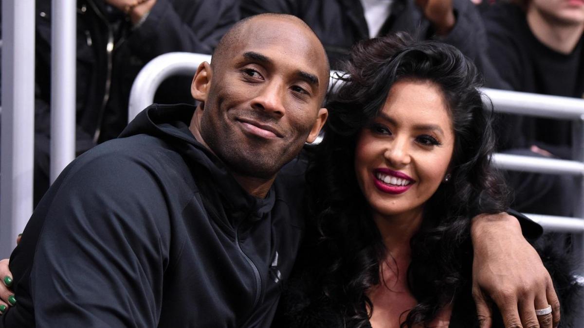 Mar 9, 2016; Los Angeles, CA, USA; Los Angeles Lakers guard Kobe Bryant (left) and wife Vanessa Bryant attend an NHL game between the Washington Capitals and the Los Angeles Kings at Staples Center. Mandatory Credit: Kirby Lee-USA TODAY Sports