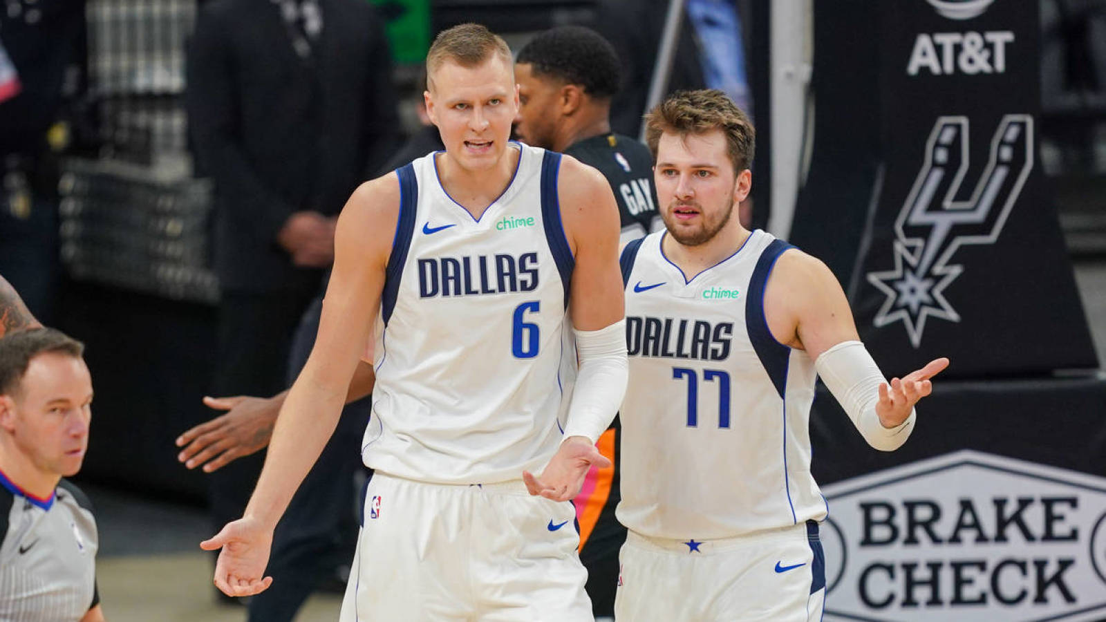 Jan 22, 2021; San Antonio, Texas, USA; Dallas Mavericks forward Kristaps Porzingis (6) and Dallas Mavericks guard Luka Doncic (77) question a call in the second half against the San Antonio Spurs at the AT&T Center. Mandatory Credit: Daniel Dunn-USA TODAY Sports