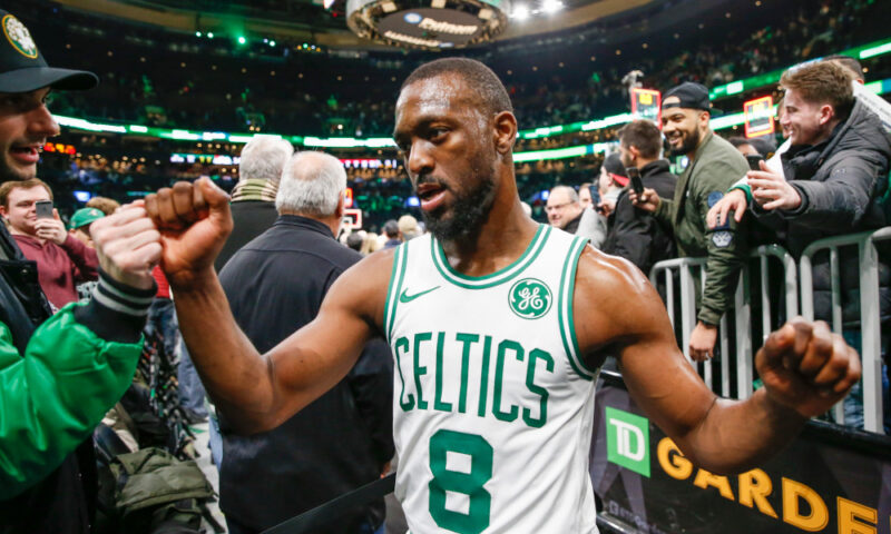 Nov 13, 2019; Boston, MA, USA; Boston Celtics point guard Kemba Walker (8) greets fans as he walks off the court after defeating the Washington Wizards at TD Garden. Mandatory Credit: Greg M. Cooper-USA TODAY Sports