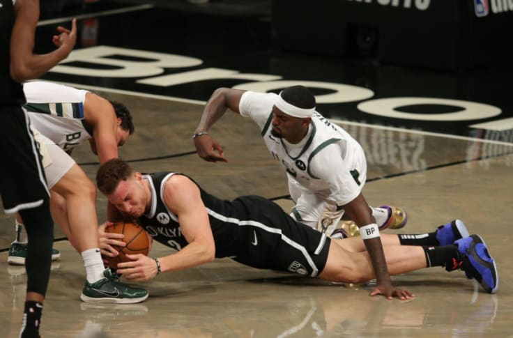 Blake Griffin and Bobby Portis hold wrestling match during Nets-Bucks