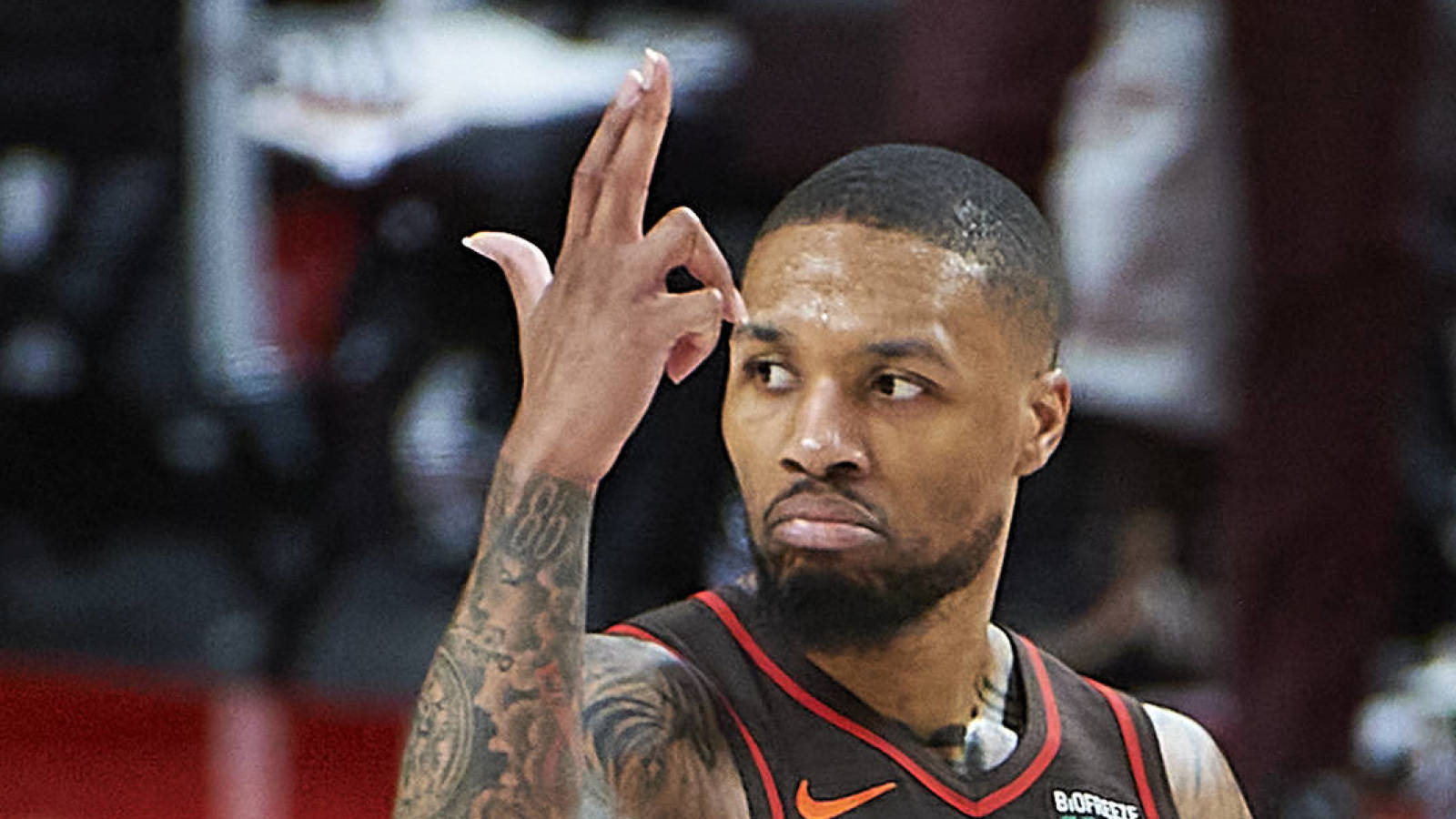 Jun 3, 2021; Portland, Oregon, USA; Portland Trail Blazers guard Damian Lillard (0) celebrates after scoring a three point basket in the first half against the Denver Nuggets during game six in the first round of the 2021 NBA Playoffs. at Moda Center. Mandatory Credit: Troy Wayrynen-USA TODAY Sports