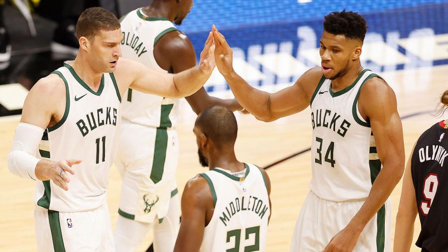 Milwaukee Bucks set NBA three-point record in monster win over Miami Heat