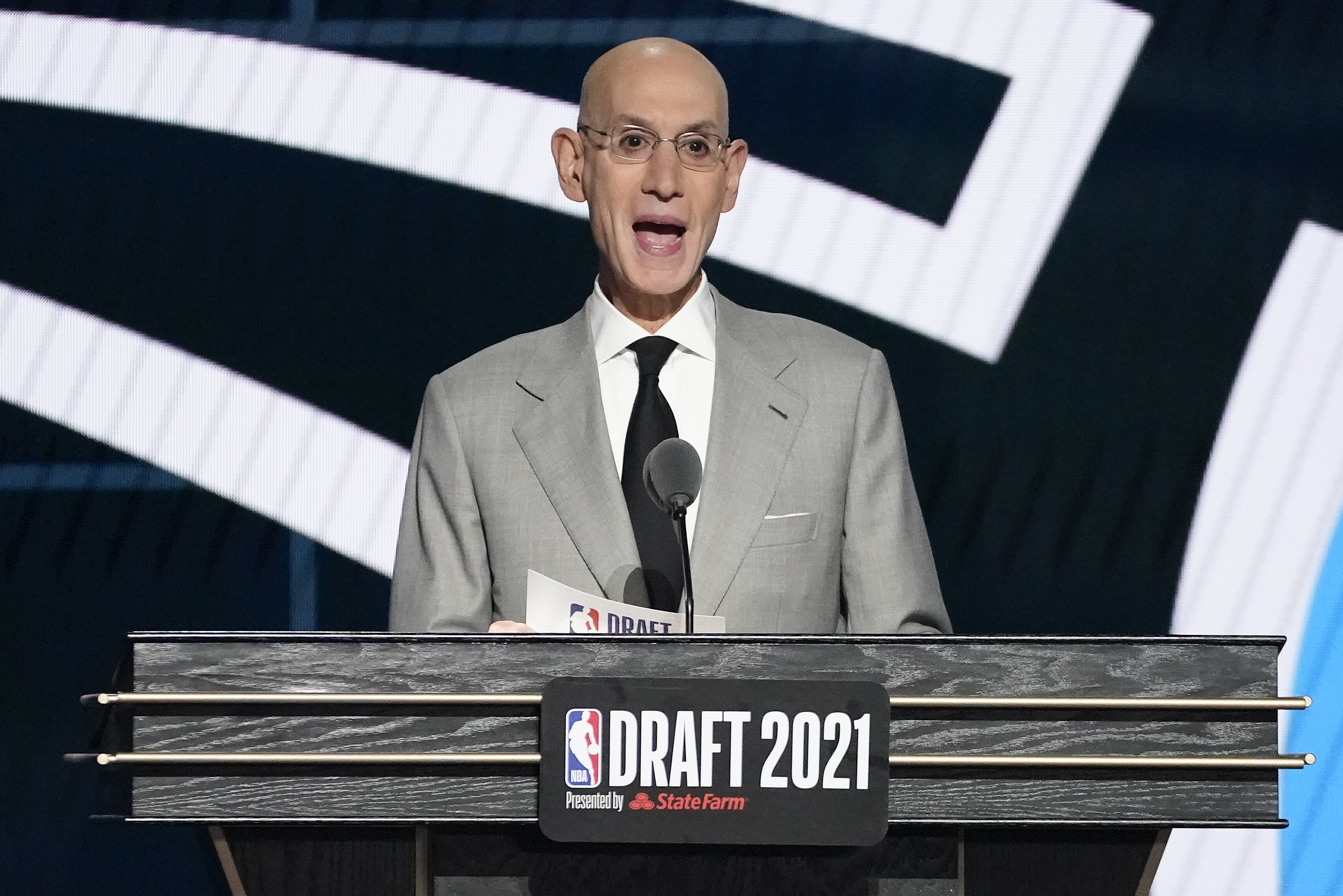 NBA Commissioner Adam Silver announces the fourth selection during the NBA basketball draft, Thursday, July 29, 2021, in New York. (AP Photo/Corey Sipkin)