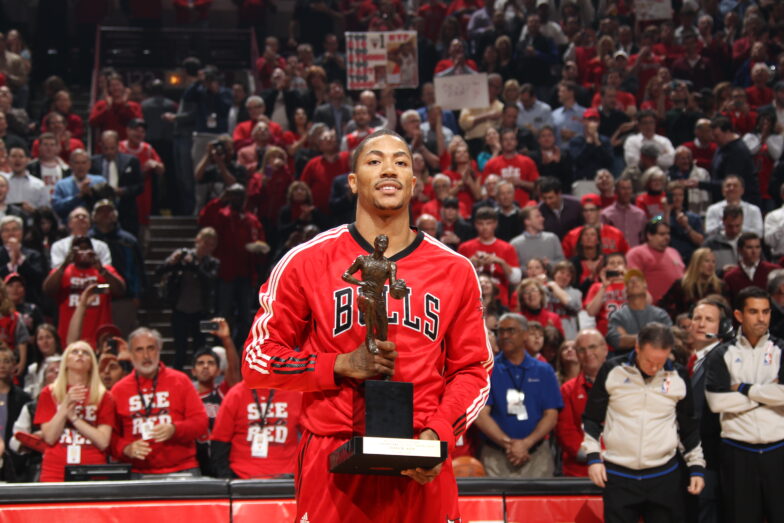 CHICAGO, IL - MAY 04: 2011 NBA MVP Derrick Rose #1 of the Chicago Bulls poses with KIA Motors NBA MVP Trophy prior to Game Two of the Eastern Conference Semifinals between the Atlanta Hawks and the Chicago Bulls on May 4, 2011 in the 2011 NBA Playoffs at the United Center in Chicago, Illinois. NOTE TO USER: User expressly acknowledges and agrees that, by downloading and/or using this photograph, user is consenting to the terms and conditions of the Getty Images License Agreement. Mandatory Copyright Notice: Copyright 2011 NBAE (Photo by Nathaniel S. Butler/NBAE via Getty Images)