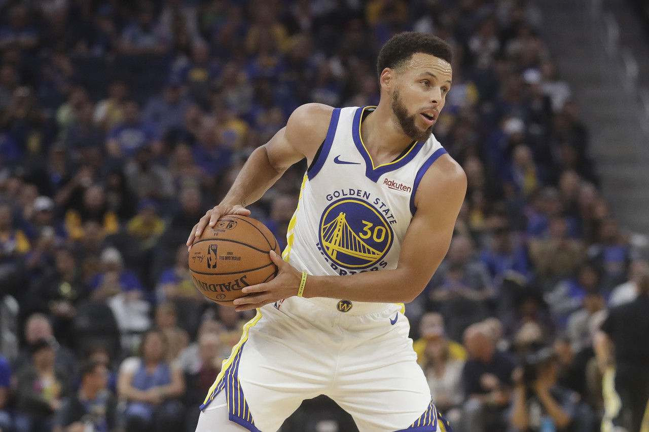 Golden State Warriors guard Stephen Curry against the Los Angeles Lakers during a preseason NBA basketball game in San Francisco, Saturday, Oct. 5, 2019. (AP Photo/Jeff Chiu)