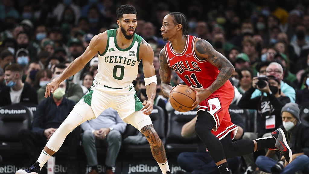 BOSTON, MA - NOVEMBER 01:  DeMar DeRozan #11 of the Chicago Bulls dribbles while guarded by Jayson Tatum #0 of the Boston Celtics at TD Garden on November 1, 2021 in Boston, Massachusetts. NOTE TO USER: User expressly acknowledges and agrees that, by downloading and or using this photograph, User is consenting to the terms and conditions of the Getty Images License Agreement. (Photo by Adam Glanzman/Getty Images)