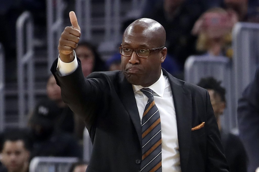 FILE - In this Nov. 4, 2019, file photo, Golden State Warriors assistant coach Mike Brown gestures during an NBA basketball game against the Portland Trail Blazers in San Francisco. Brown is the coach of the Nigerian men’s Olympic basketball team this summer, and that team starts preparations for the Tokyo Games with training camp beginning this weekend in Oakland, Calif. (AP Photo/Jeff Chiu, File)