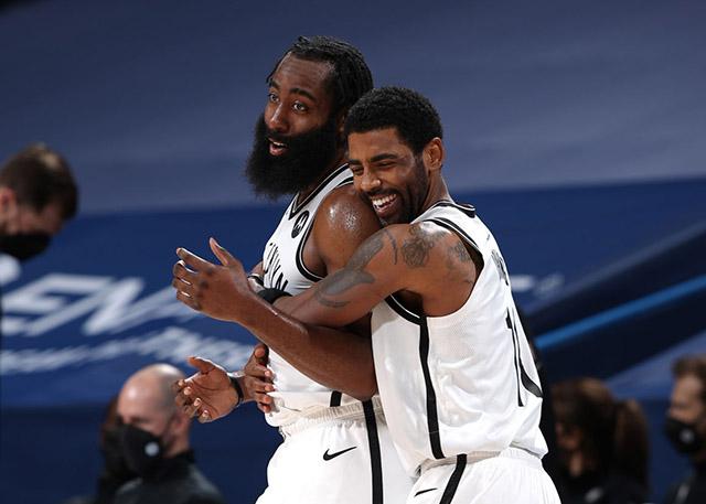 OKLAHOMA CITY, OK - JANUARY 29: Kyrie Irving #11 of the Brooklyn Nets & James Harden #13 of the Brooklyn Nets hug during the game against the Oklahoma City Thunder on January 29, 2021 at Chesapeake Energy Arena in Oklahoma City, Oklahoma. NOTE TO USER: User expressly acknowledges and agrees that, by downloading and or using this photograph, User is consenting to the terms and conditions of the Getty Images License Agreement. Mandatory Copyright Notice: Copyright 2021 NBAE (Photo by Zach Beeker/NBAE via Getty Images)