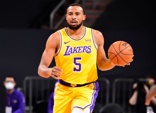 PHOENIX, AZ - DECEMBER 16: Talen Horton-Tucker #5 of the Los Angeles Lakers drives in the game against the Phoenix Suns on December 16, 2020 at the Talking Stick Resort Arena in Phoenix, Arizona. NOTE TO USER: User expressly acknowledges and agrees that, by downloading and or using this Photograph, user is consenting to the terms and conditions of the Getty Images License Agreement. Mandatory Copyright Notice: Copyright 2020 NBAE (Photo by Barry Gossage/NBAE via Getty Images)