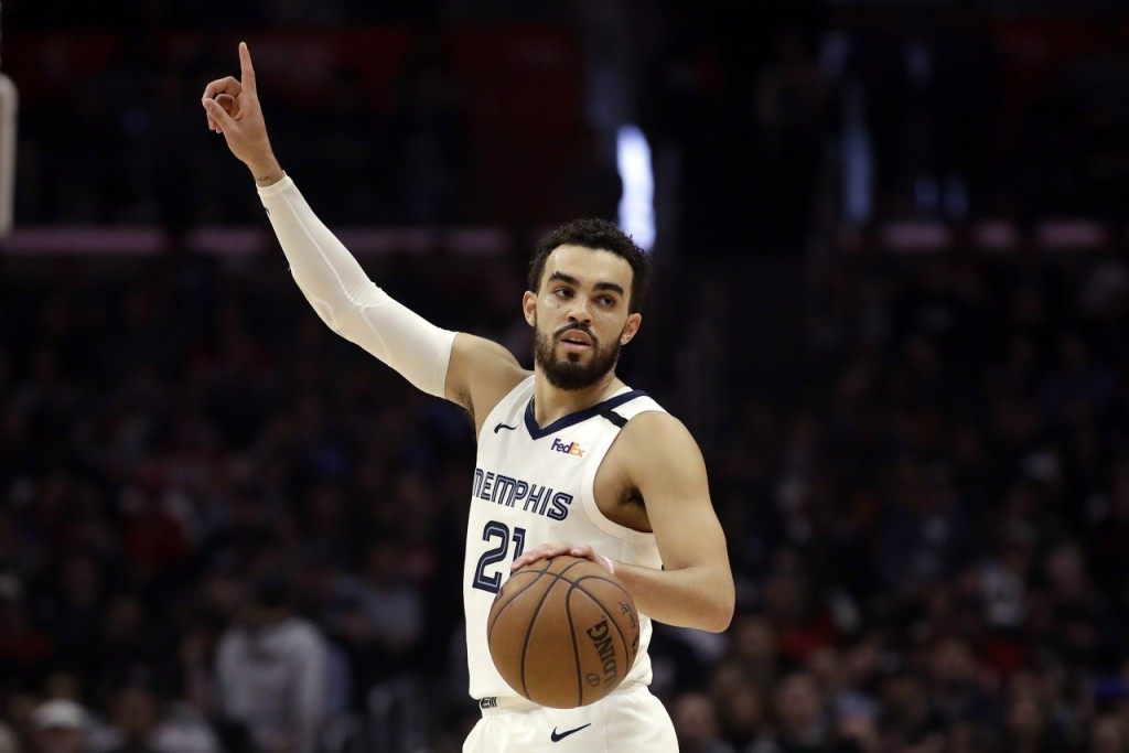 Memphis Grizzlies' Tyus Jones (21) dribbles against the Los Angeles Clippers during the second half of an NBA basketball game Saturday, Jan. 4, 2020, in Los Angeles. (AP Photo/Marcio Jose Sanchez)