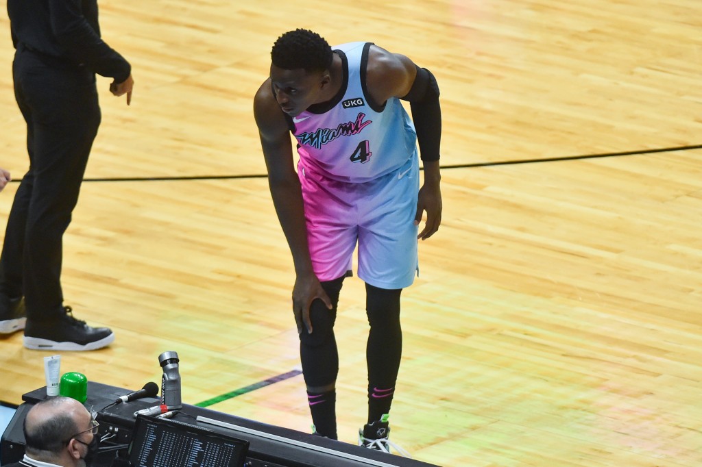 MIAMI, FL - APRIL 08: Victor Oladipo #4 of the Miami Heat holds his right knee after being injured in the second half against the Los Angeles Lakers at American Airlines Arena on April 8, 2021 in Miami, Florida. NOTE TO USER: User expressly acknowledges and agrees that, by downloading and or using this photograph, User is consenting to the terms and conditions of the Getty Images License Agreement.(Photo by Eric Espada/Getty Images)