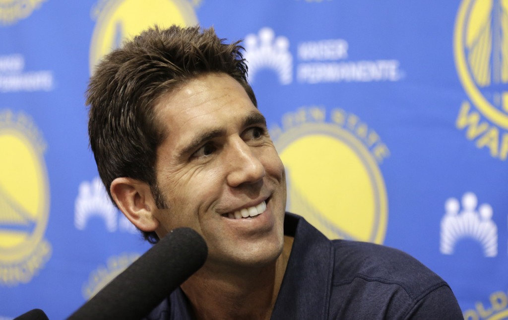 Golden State Warriors general manager Bob Myers smiles during an NBA basketball media availability Thursday, Sept. 22, 2016, in Oakland, Calif. (AP Photo/Ben Margot)