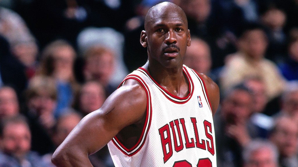 CHICAGO, IL - MARCH 16: Michael Jordan #23 of the Chicago Bulls looks on during the game against the New Jersey Nets on March 16, 1998 at the United Center in Chicago, Illinois. NOTE TO USER: User expressly acknowledges and agrees that, by downloading and/or using this photograph, user is consenting to the terms and conditions of the Getty Images License Agreement. Mandatory Copyright Notice: Copyright 1998 NBAE (Photo by Scott Cunningham/NBAE via Getty Images)