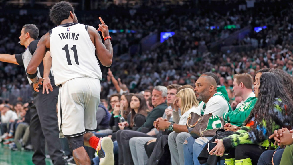 Nets-Kyrie-Irving-flips-off-unruly-Celtics-fans-during-Brookyln-Boston