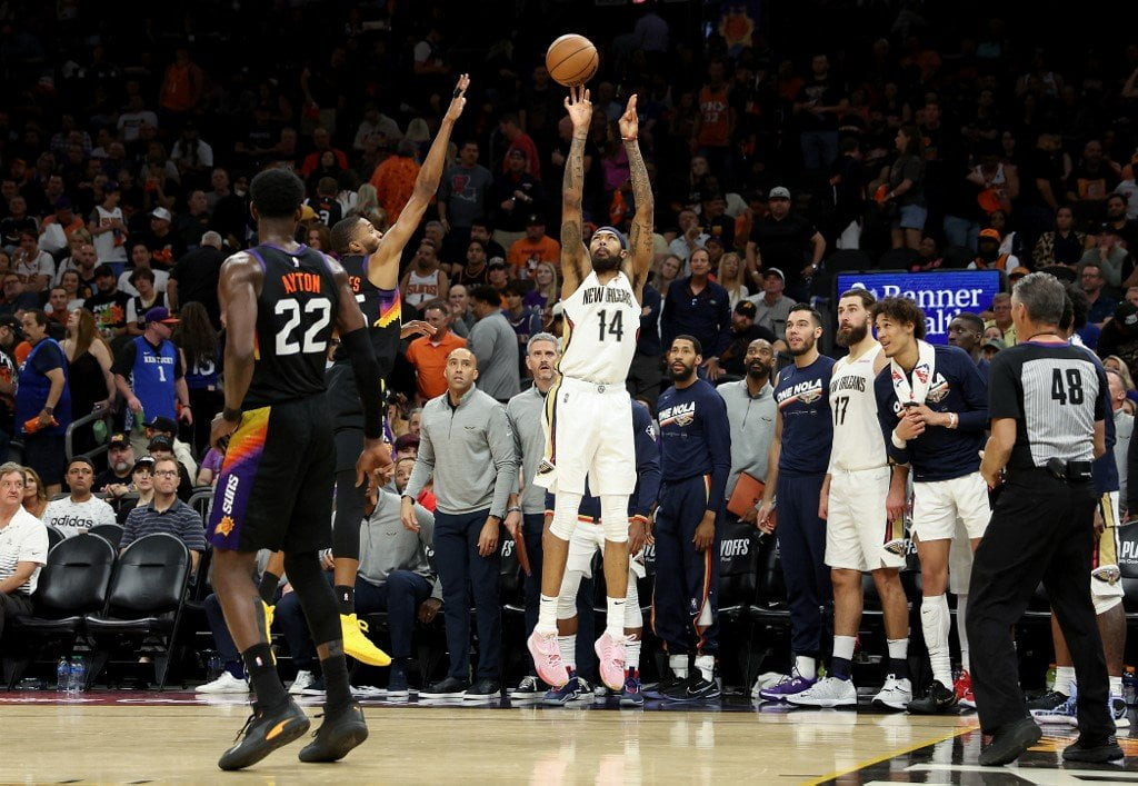 NBA-After-Devin-Booker-exits-injured-Pelicans-push-past-Suns