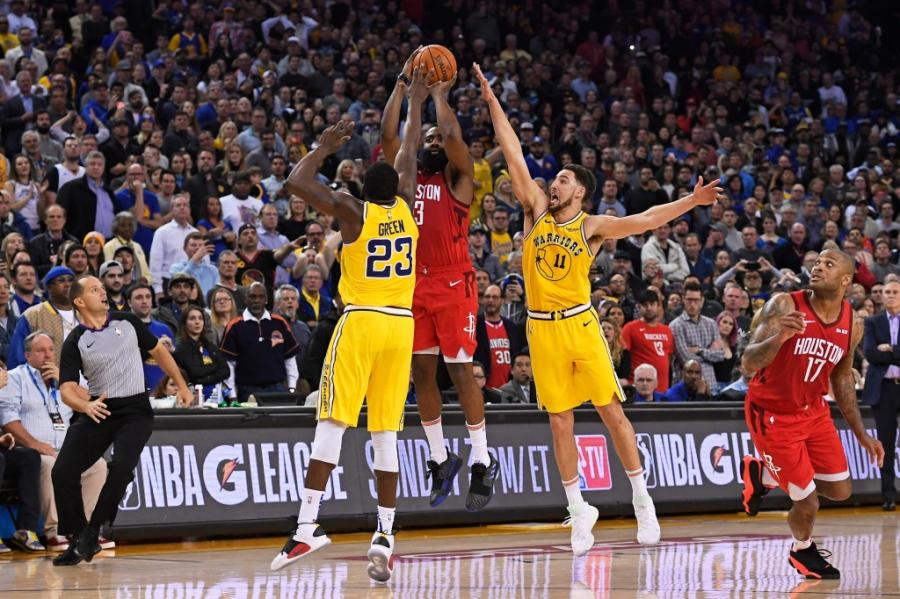 Warriors prevail against Rockets in overtime