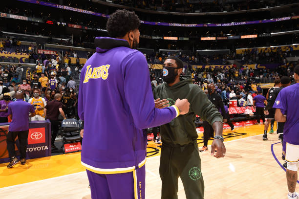 LOS ANGELES, CA - OCTOBER 3: Anthony Davis #3 of the Los Angeles Lakers talks with Kyrie Irving #11 of the Brooklyn Nets after the game on October 3, 2021 at STAPLES Center in Los Angeles, California. NOTE TO USER: User expressly acknowledges and agrees that, by downloading and/or using this Photograph, user is consenting to the terms and conditions of the Getty Images License Agreement. Mandatory Copyright Notice: Copyright 2021 NBAE (Photo by Andrew D. Bernstein/NBAE via Getty Images)