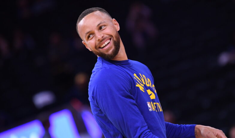 Stephen Curry walks across the stage at Davidson graduation ceremony | NBA.com