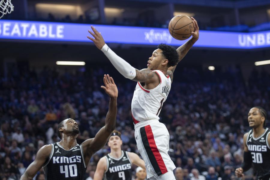 Grant rallies Blazers past Kings 113-108 in opener