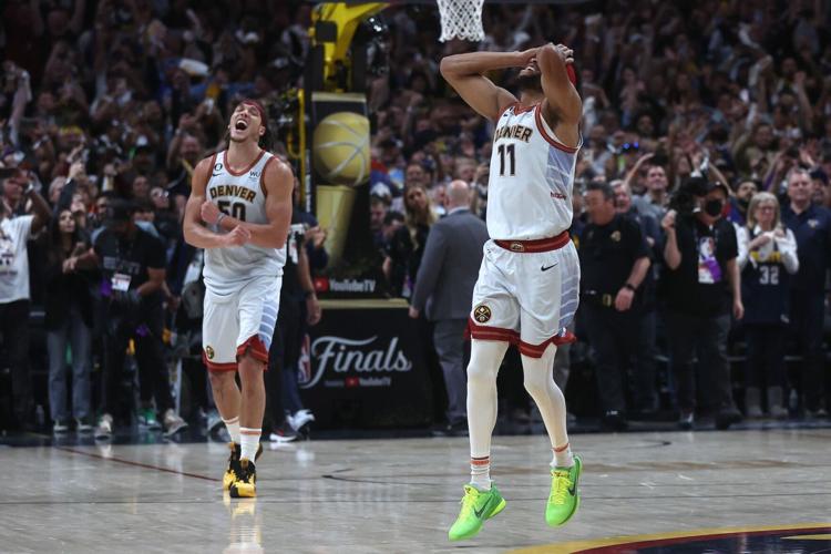 Denver Nuggets win first NBA championship title in Game 5 victory over  Miami Heat | Sports | kwwl.com