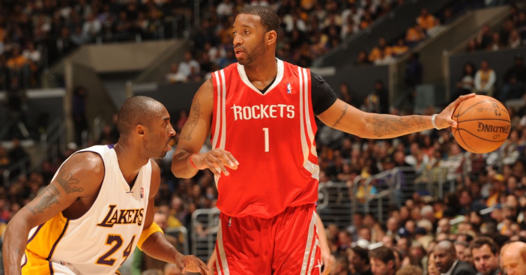 hi-res-83624810-tracy-mcgrady-of-the-houston-rockets-holds-the-ball_crop_north (1)