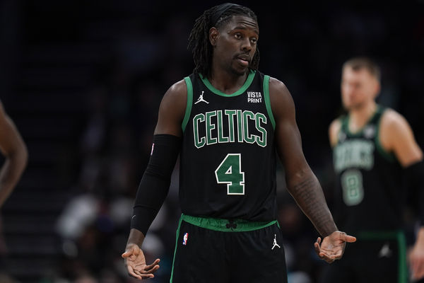 Boston Celtics guard Jrue Holiday reacts after a play in the second half of an NBA basketball game against the Charlotte Hornets, Monday, Nov. 20, 2023, in Charlotte, N.C. (AP Photo/Erik Verduzco)